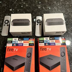 2 Apple TV Old Generation And 2 Fire Tv Boxes