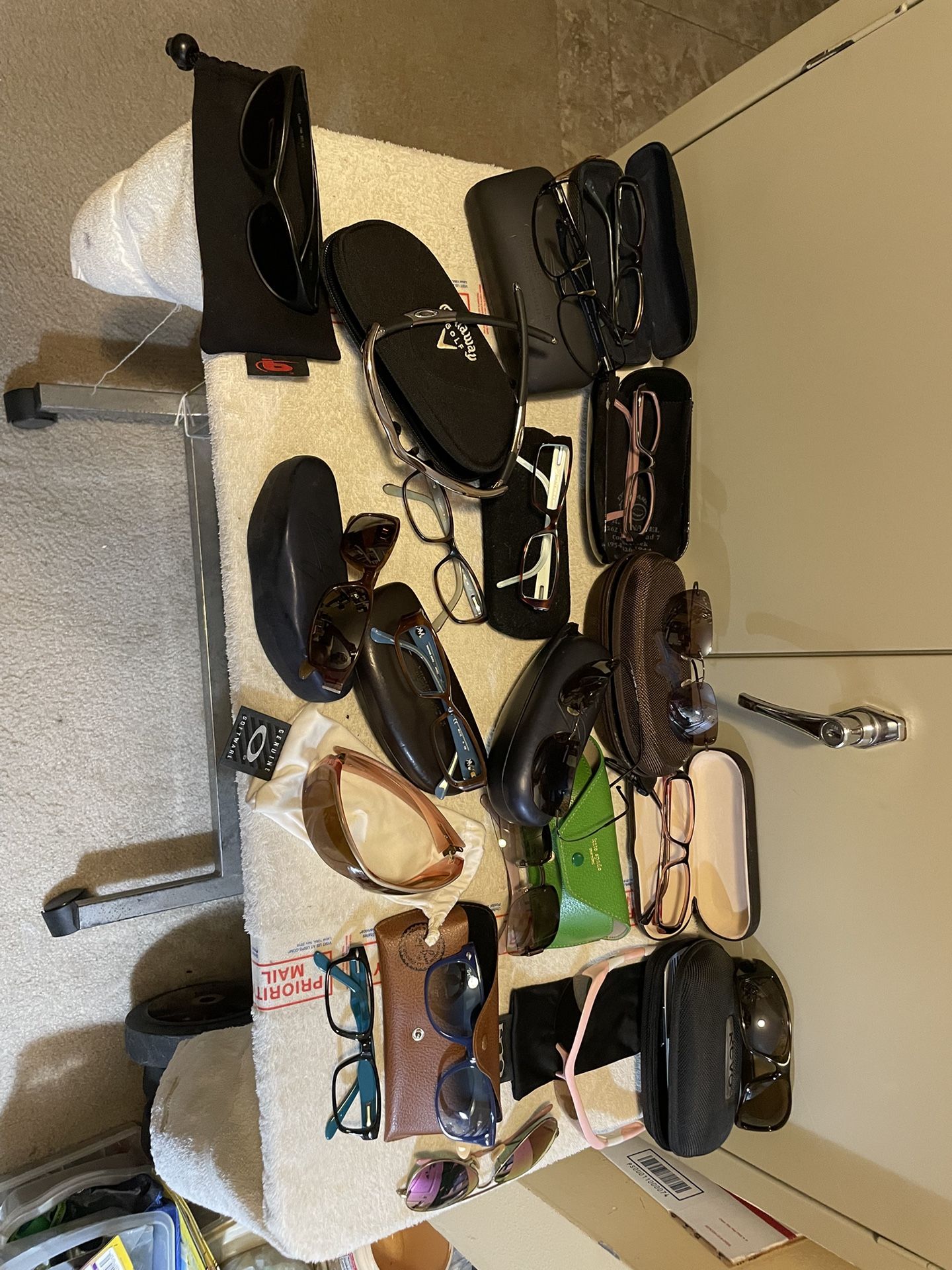 Sunglasses. Eyeglasses various Conditions some new some prescription selling altogether.