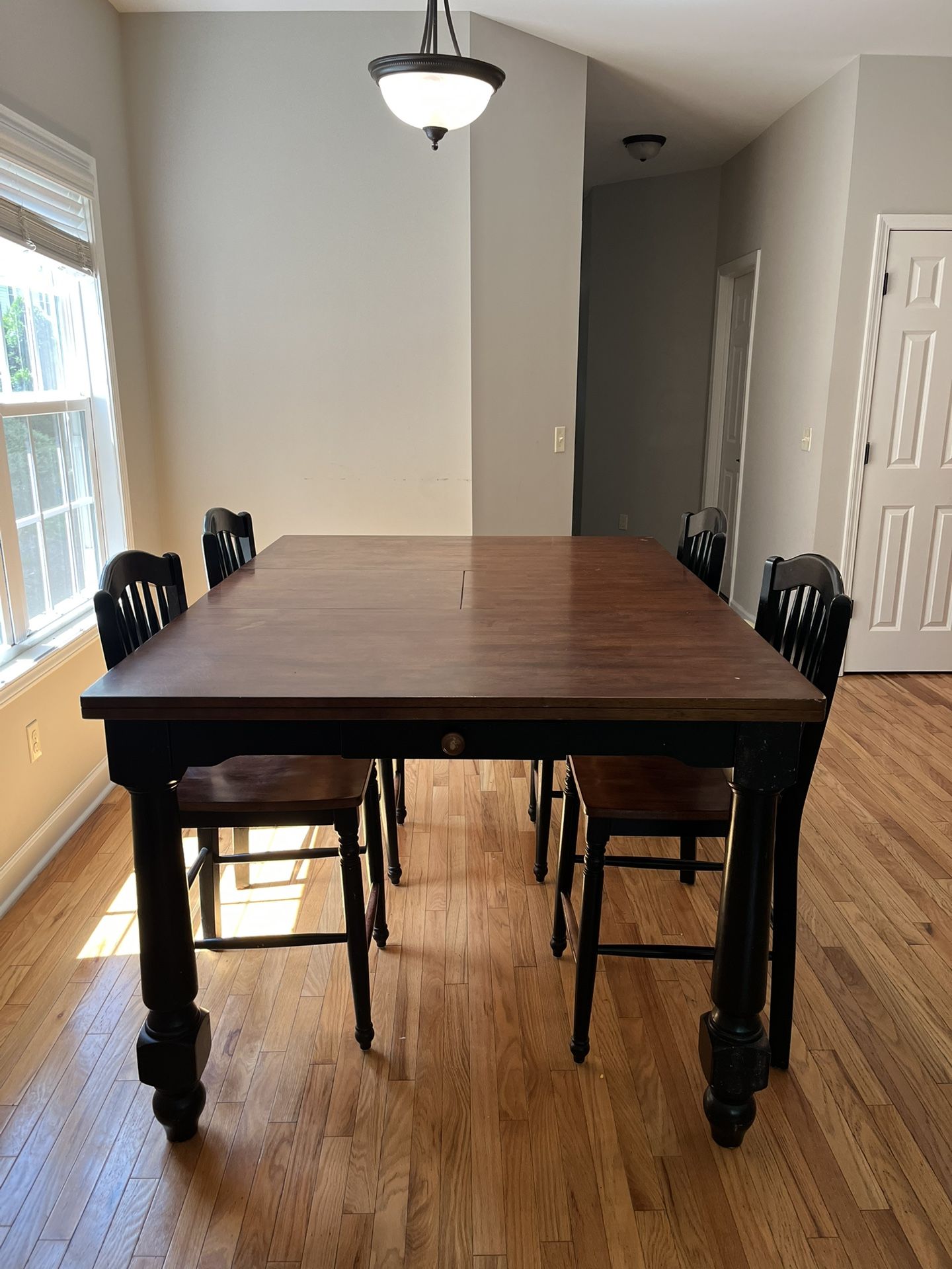 Solid black & red/brown mahogany dining table