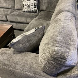 New ashley Gray sectional 3 Piece. Was $2299 Now $1499. Last One. 