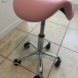 Pink rolling stool