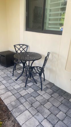 Outdoor bistro table and 2 chairs $73