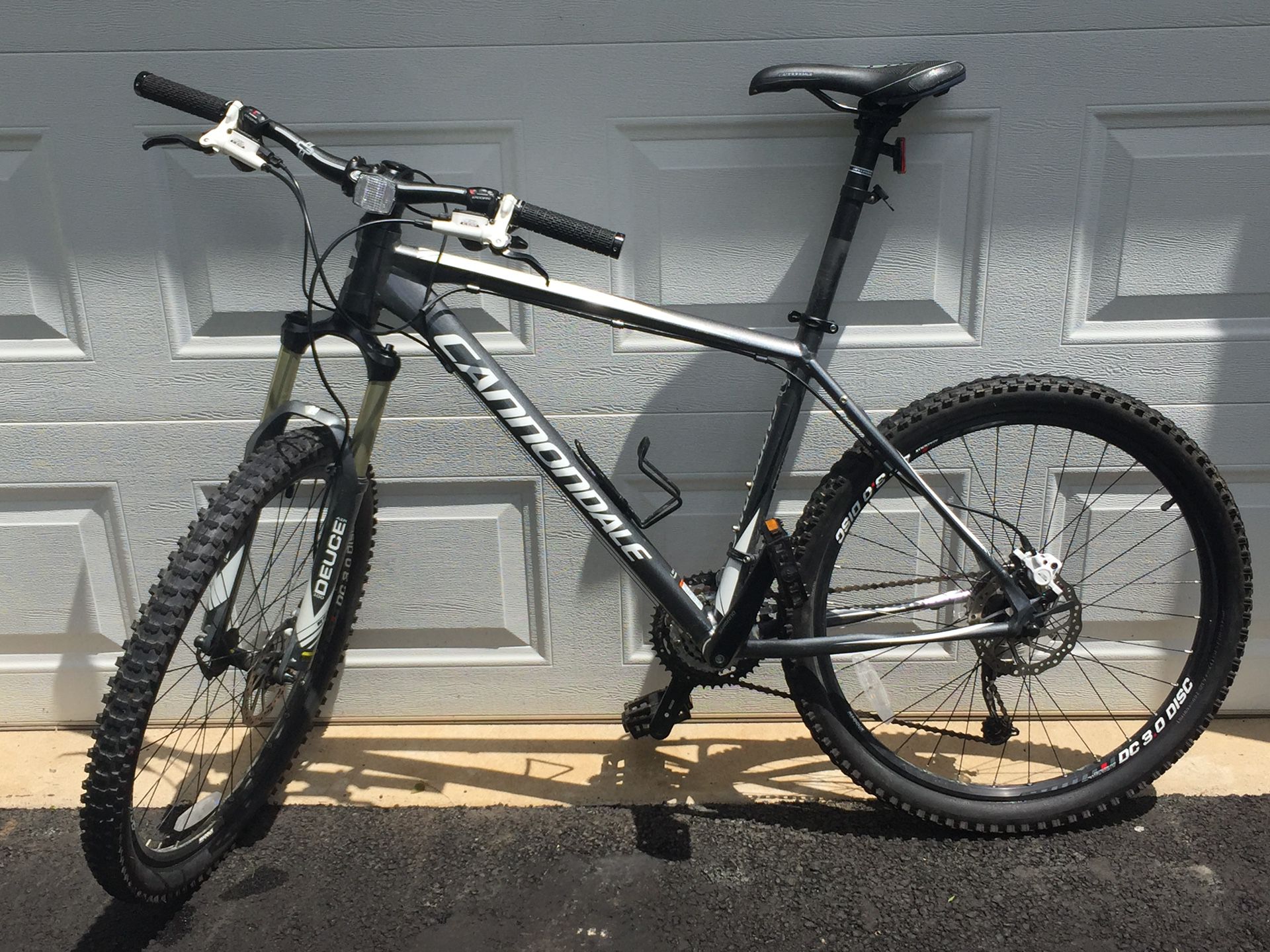 Cannondale Mountain Bike, low miles, like new, many upgrades. $350. Large frame, wheels 54 centimeters.