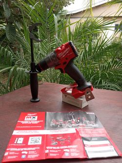 Milwaukee 18 v new.  Fuel hammer drill. .2 speed.   1/2".   w/ handle