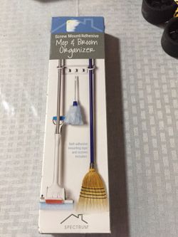 Mop and broom organizer
