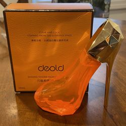 Orange high heel perfume