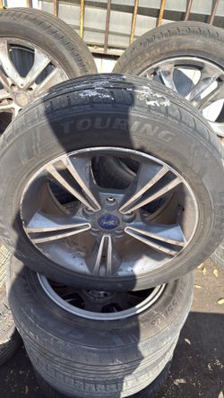 Set of 4 wheels and tires for 2015 ford focus