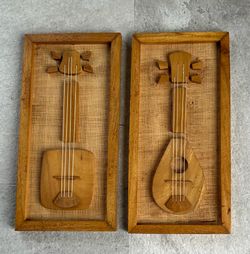 Pair of MCM Enesco framed wall plaques