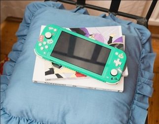 Nintendo Switch Lite – Turquoise +4 Games