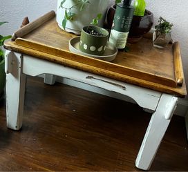 small, rustic wooden coffee table or low bedside table 20$