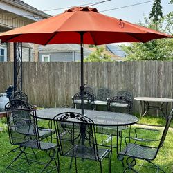 Wrought Iron Patio Set With 6 Chairs And New Umbrella