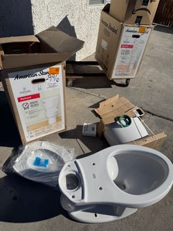 American Standard Reliant Elongated Toilet