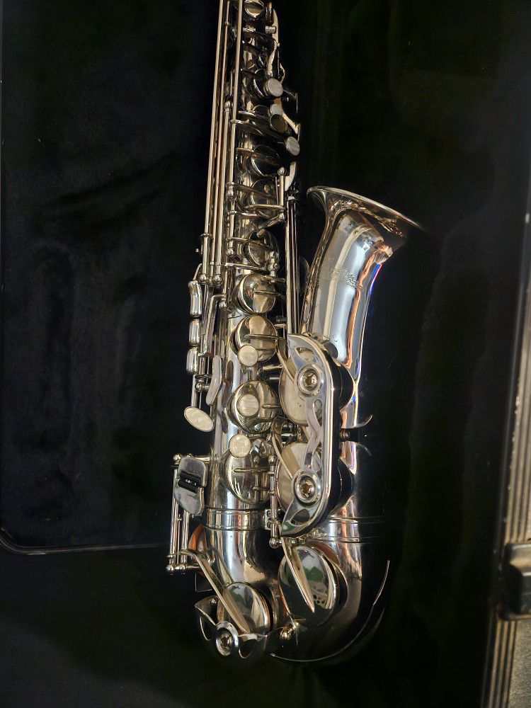 Saxophone With Black Velvet Case