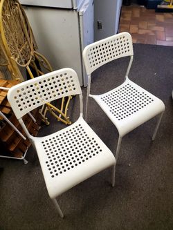 White Plastic and Metal Chairs (2)
