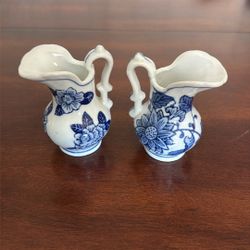 2 Small Blue And White Pitchers 