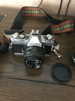 Minolta XD11 camera kit with 2 lenses and flash