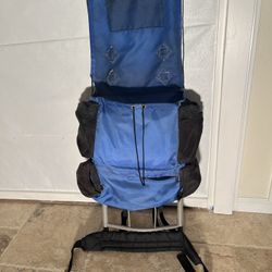 Medium Size Backpack With Frame And Top Cover.  Excellent Condition.