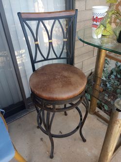 Black wrought iron & leather barstools, (good condition); $15.00 each or all 3 for $30.00...