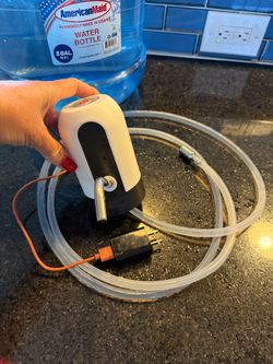 “NEW”Electric up with charge “ for a5 gal water bottle