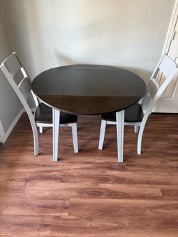 Grey and brown wood drop leaf table