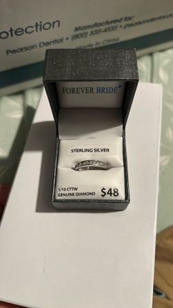 STERLING SILVER 1/10 CTTW GENUINE DIAMOND