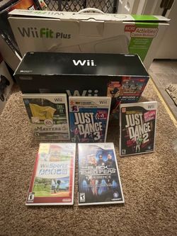 Wii game console, Wii fit plus board and games/sports included