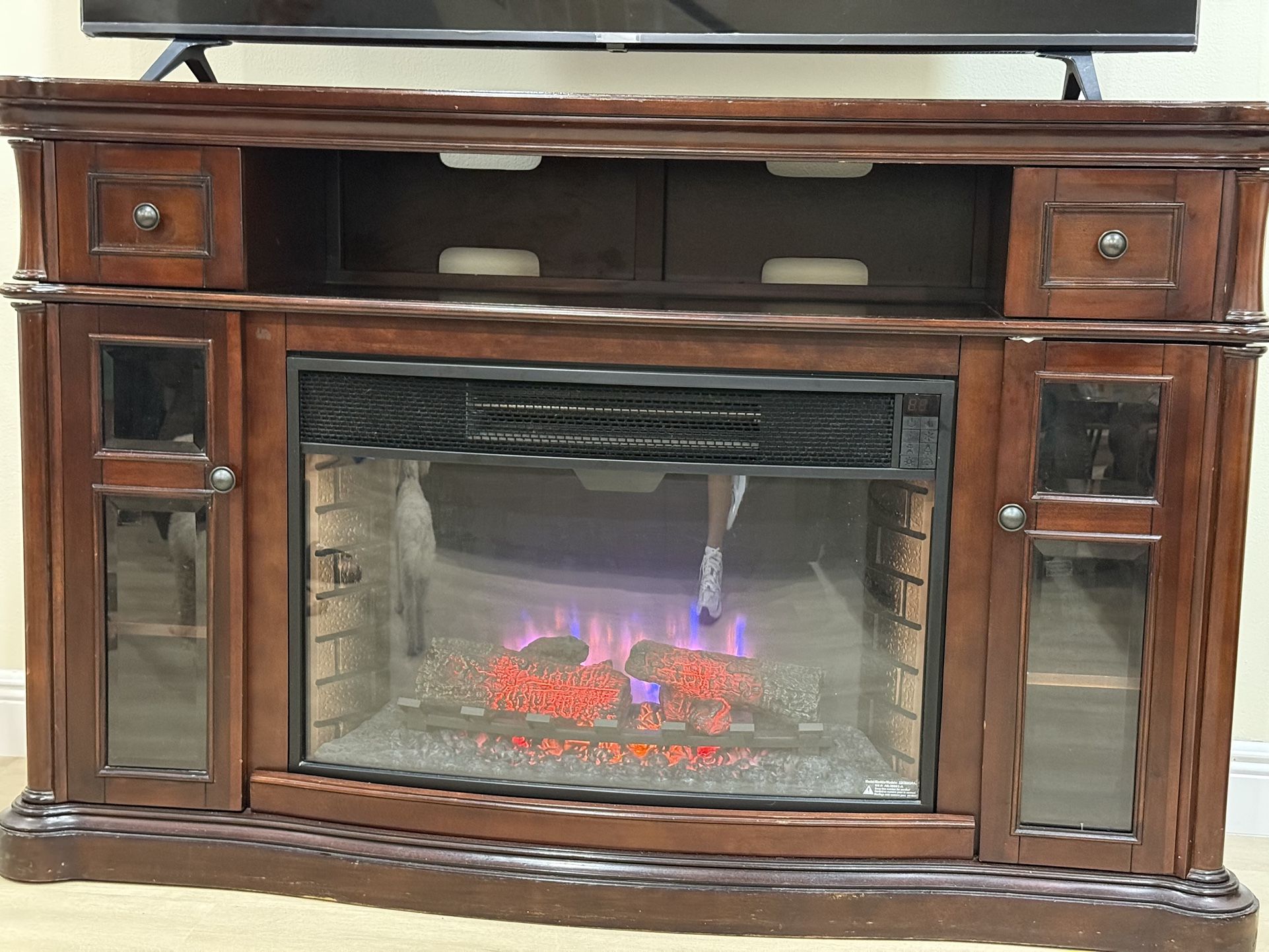 Wooden Tv Stand With Cabinets & A Fire Place