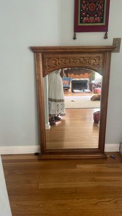 Mirror with wooden frame