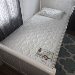 Twin White Sleigh Bed Unused Mattress Included.