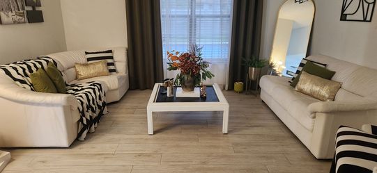 White sectional with matching table