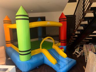 Kids play bounce house