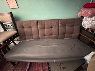 Small futon like couch grey sofa