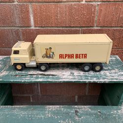 Vintage Alpha Beta ERTL tractor and trailer