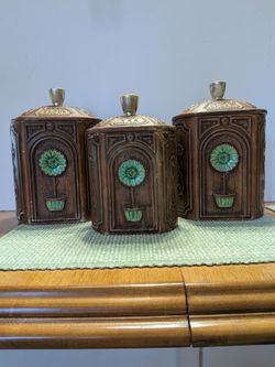 Vintage 1970's Treasure Craft Ceramic Kitchen Canister Trio with Embossed Aqua Sunflower