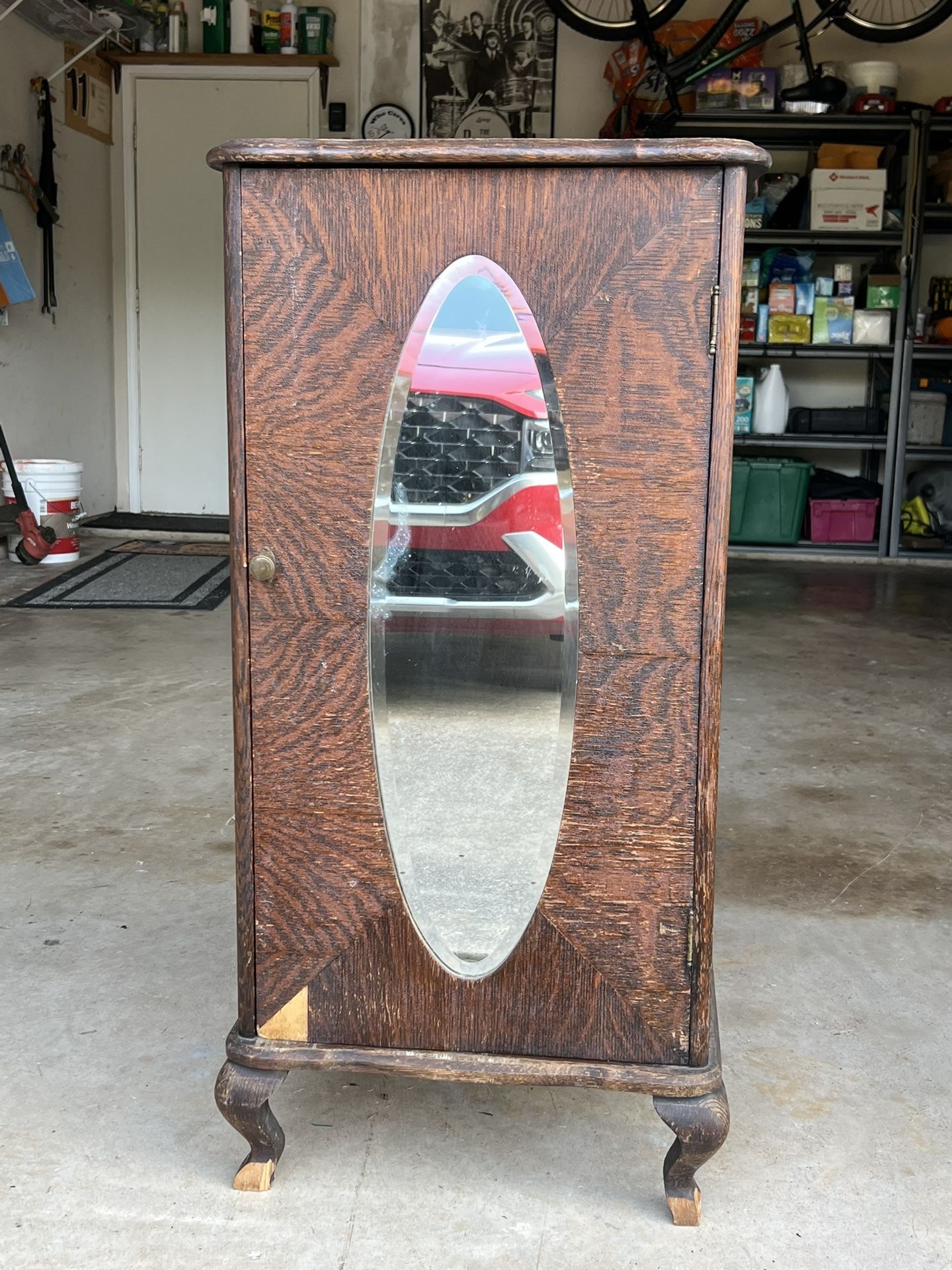 Antique Wood (oak) Storage Cabinet 4 adjustable shelves Beveled Mirror on hinged front door 