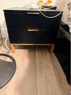 Black and gold dresser with 2 night stands