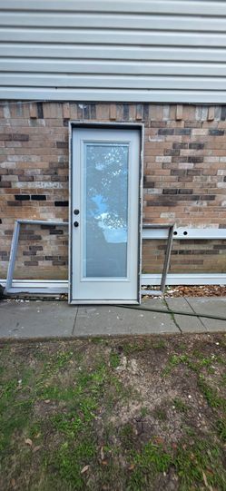 32x80 back door metal with miniblinds. Framed ready to install