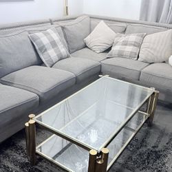 Gray Sofa With A Coffee Table 