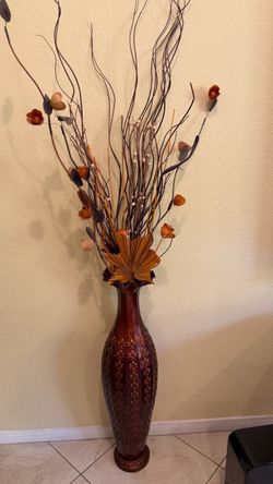 Tall decorative vase with fillers