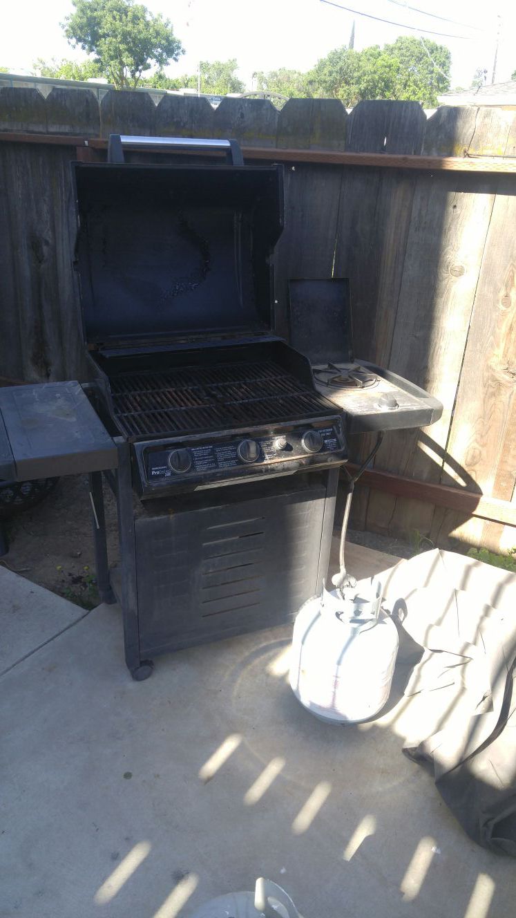 Propane grill with cover