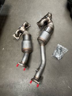 A pair of Aftermarket Exhaust Manifolds for BMW N52 Engine