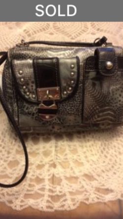 Organizer purse with built in fold out wallet on back. Leopard print. SOLD