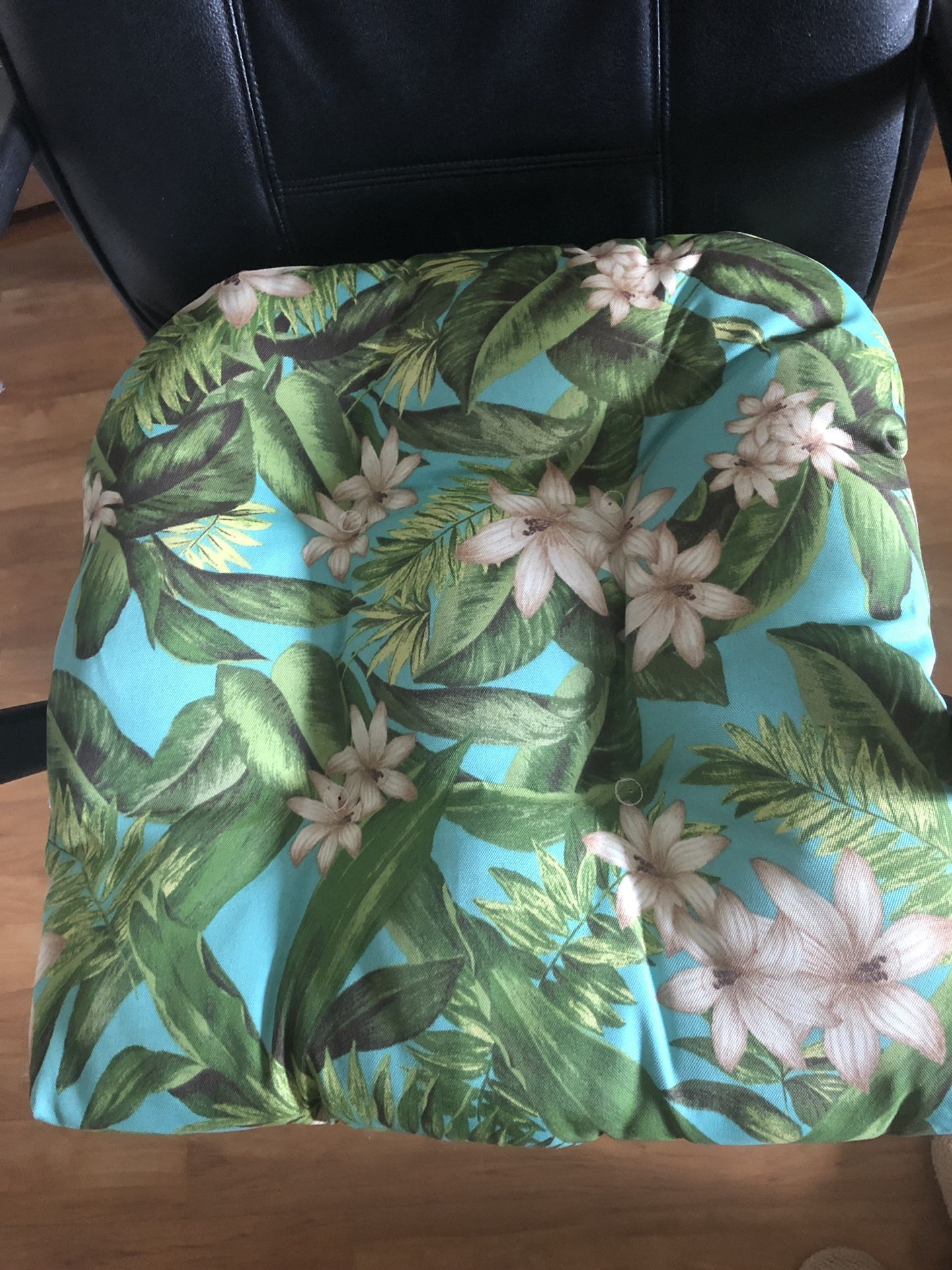 three cushions for chairs in perfect condition, like new ones, have a double-sided pattern