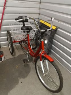 Three-wheel bike red good condition
