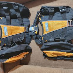 2 KURGO DOG BACKPACKS. SZ M BLACK AND ORANGE.  NEVER USED. 