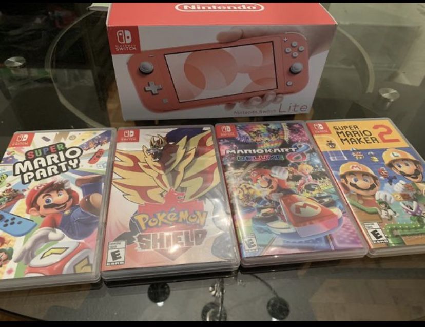 BRAND NEW Nintendo Switch Coral LIMITED COLOR $205 or $230 with 1 game . PICK UP ONLY-price is FIRM