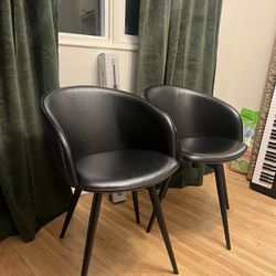Pair of Faux Leather Black Rotating Chairs 