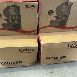 Brand new Britax Pioneer harness-to-booster car seat. Never used — still sealed in plastic with manuals included.