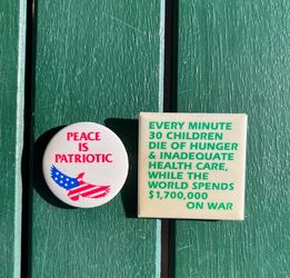 2 Vintage anti-war buttons; protest, political, & patriotic memorabilia