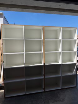 Two tall storage  cabinets price for each cabinets